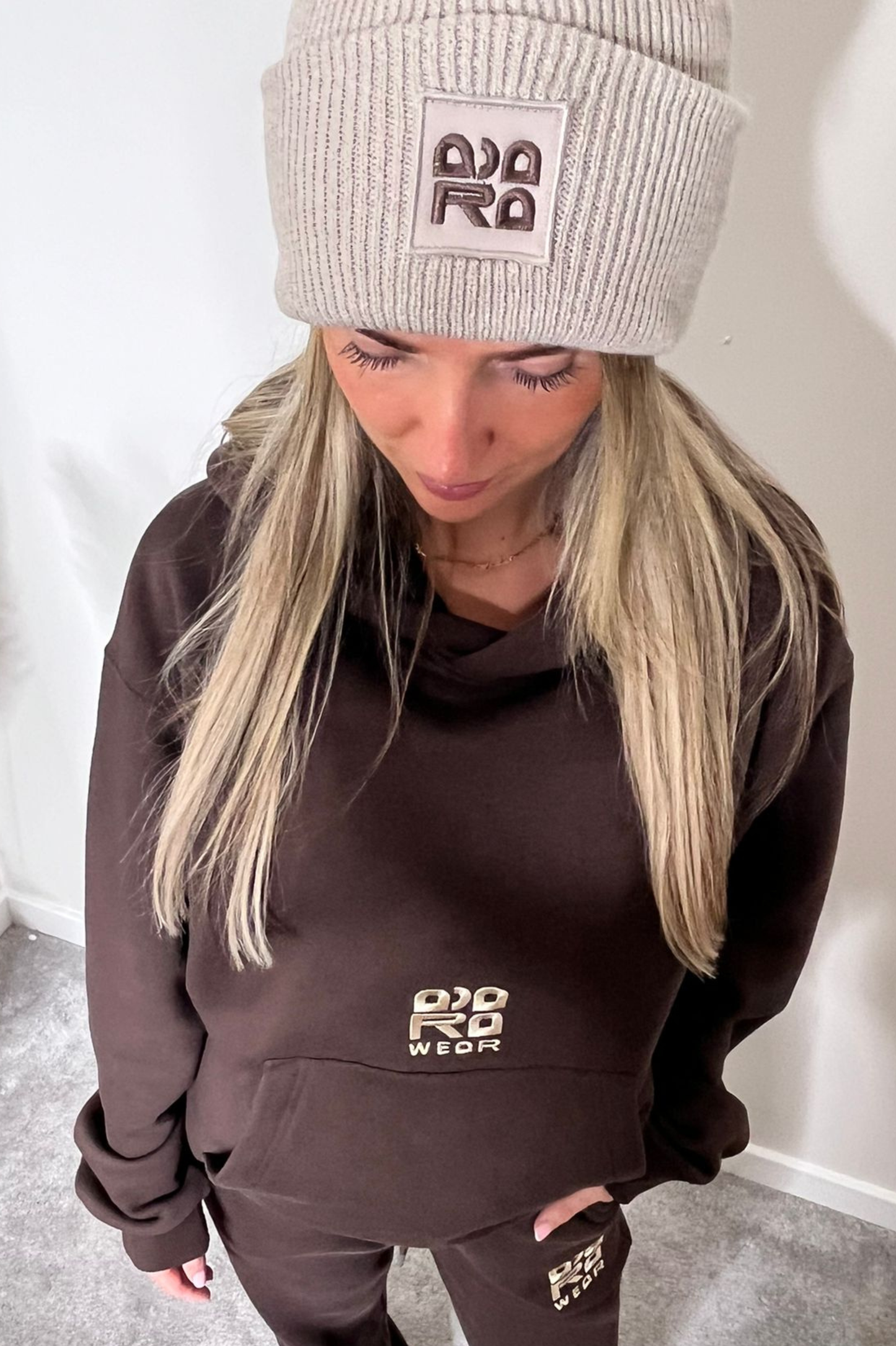 Beige beanie with brown embroidery