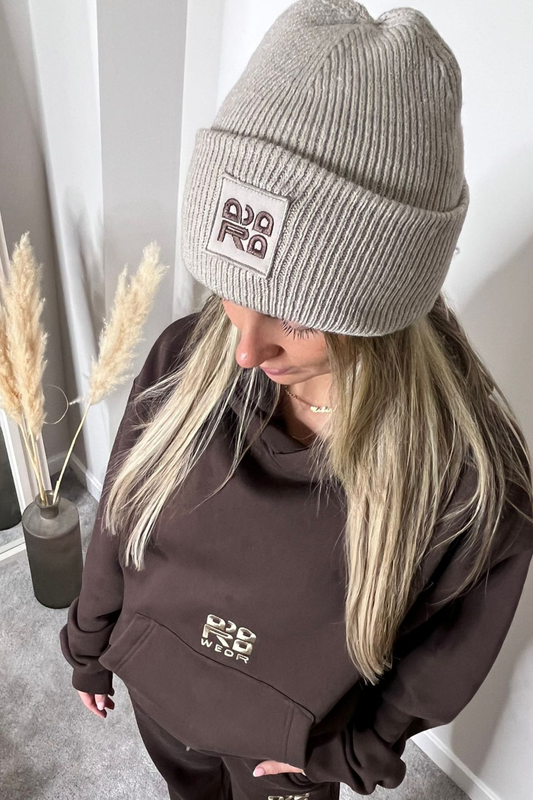 Beige beanie with brown embroidery