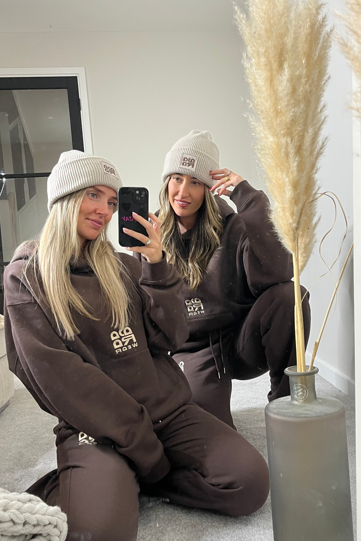 Beige beanie with brown embroidery